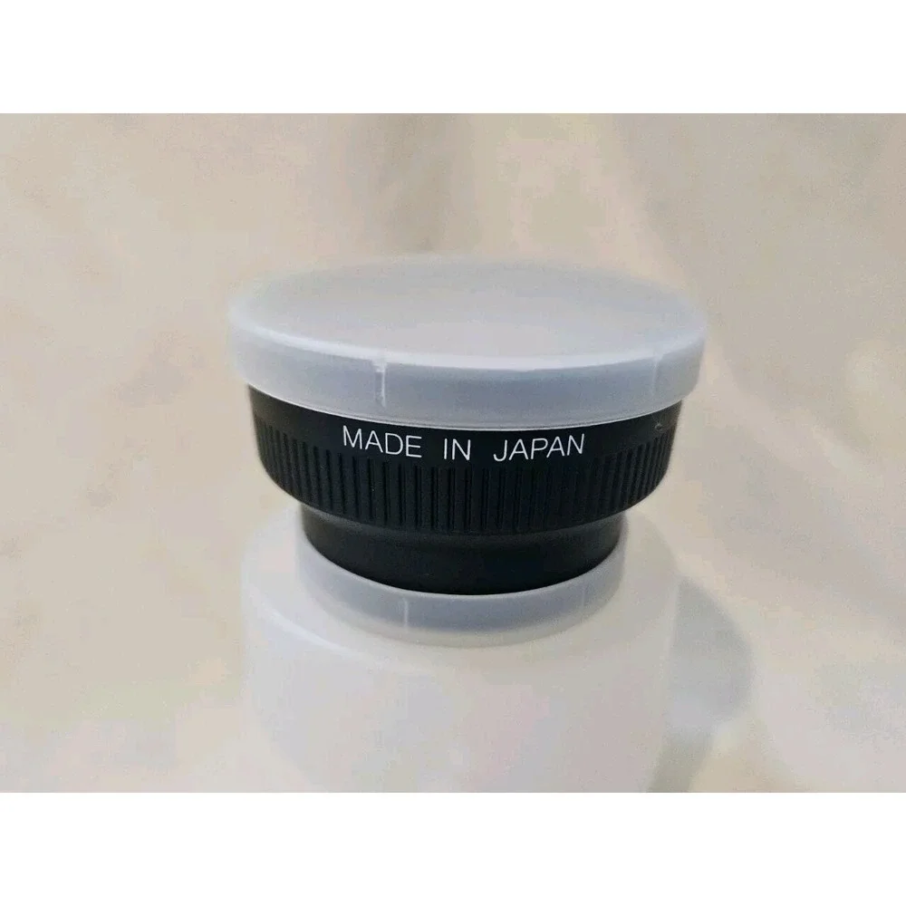 Wide angle lens made in Japan,‎ listed with Both Lens caps